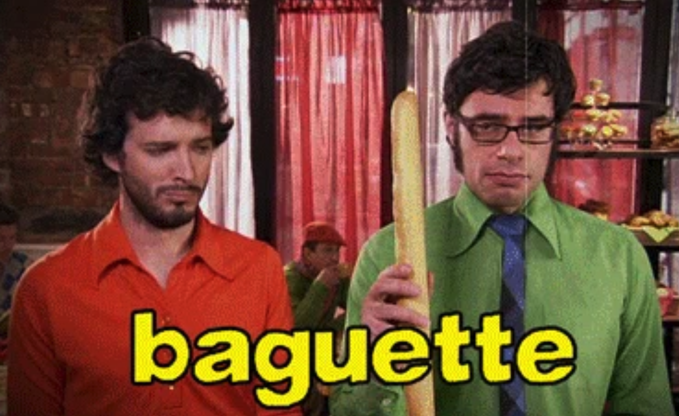 Brett and Jemaine are "Fou-de-fa-fa" for a baguette